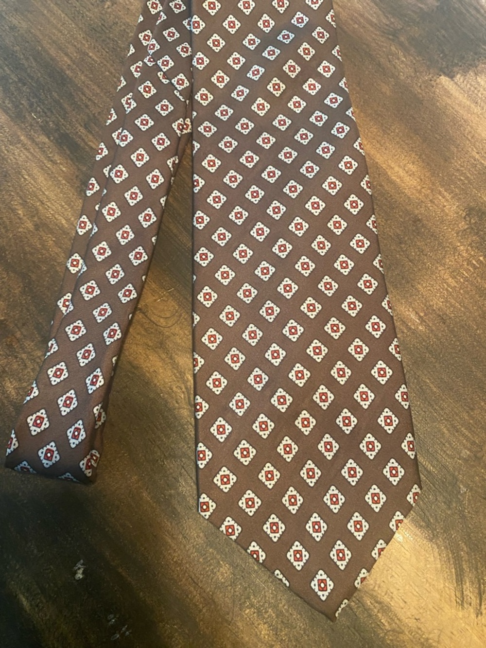 Dior Brown Tie with Red and White Geometric Medallions